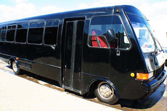 30-passenger black limo bus